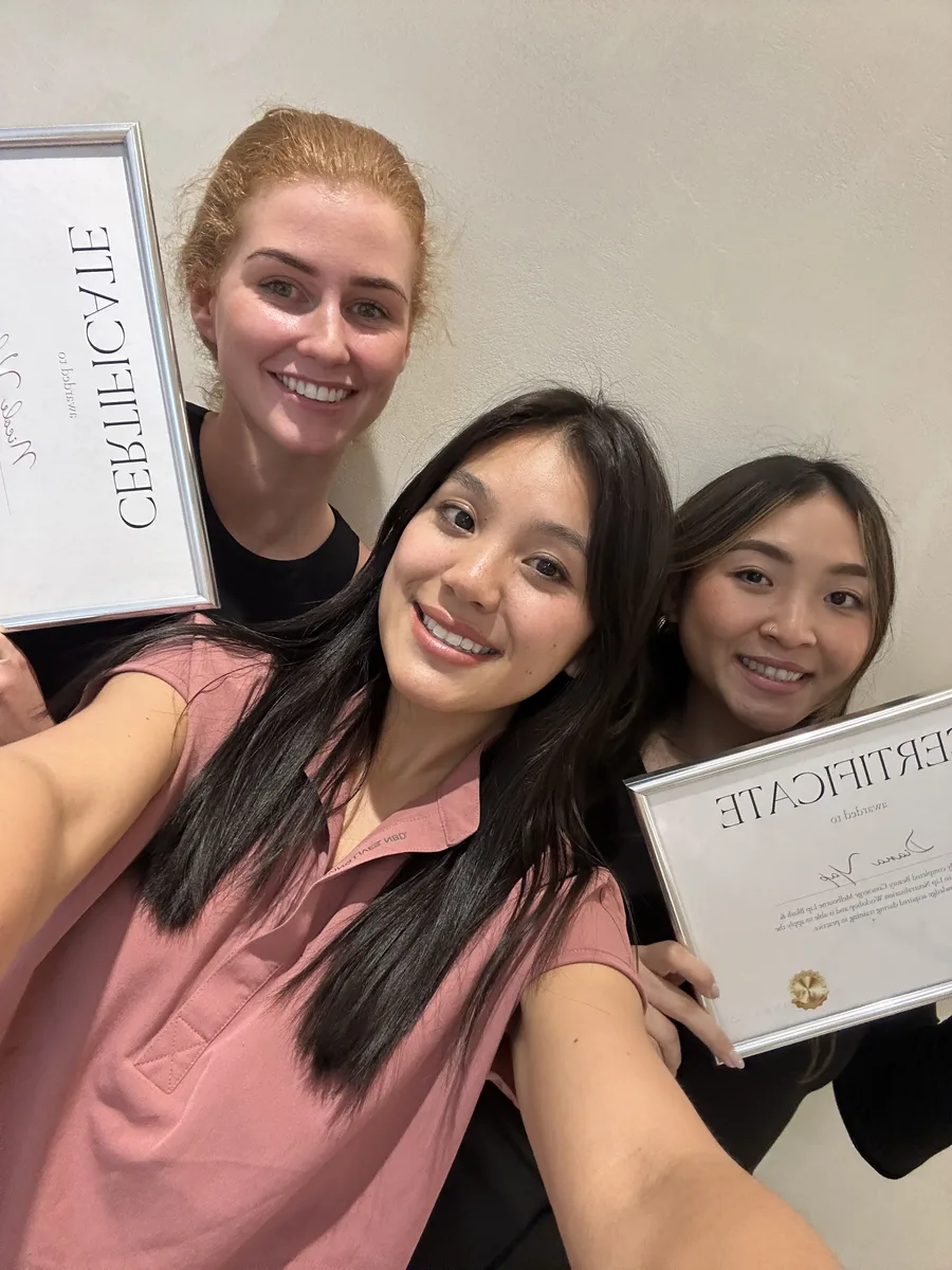 Graduates with their certificates on the final day
