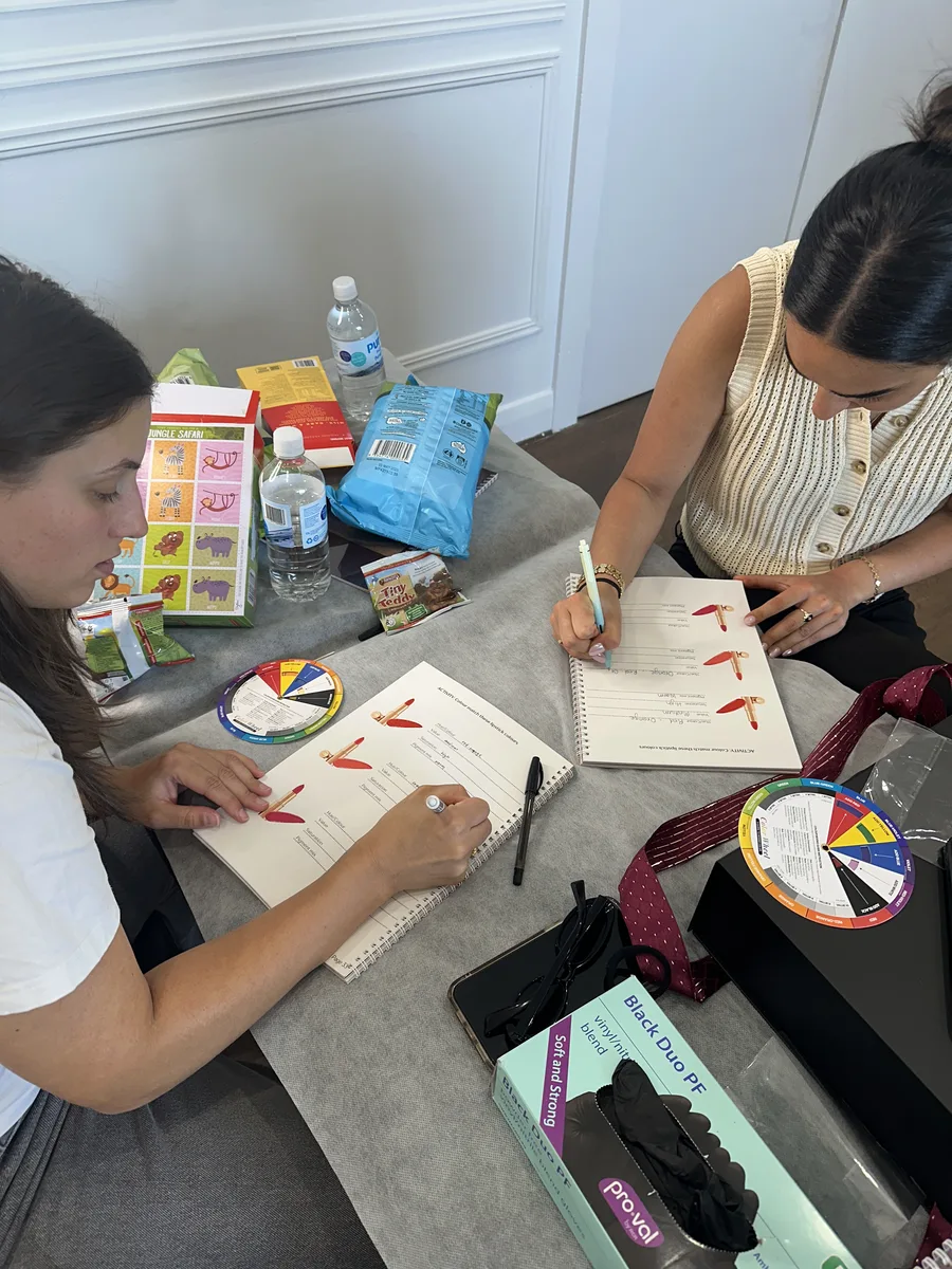 Students working through colour theory exercises
