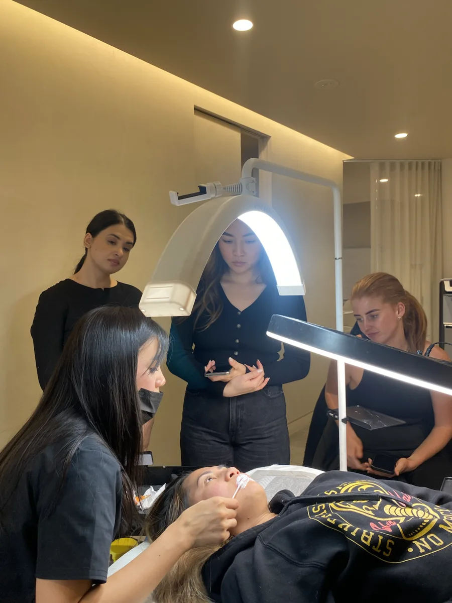 Stephanie demonstrating on a live model